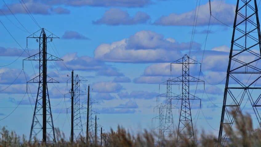 power lines against a blue sky