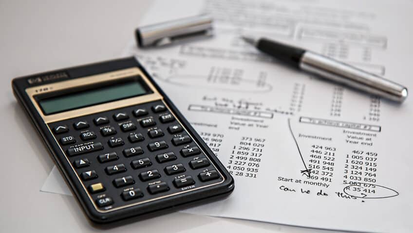 A calculator and budget planning sheets